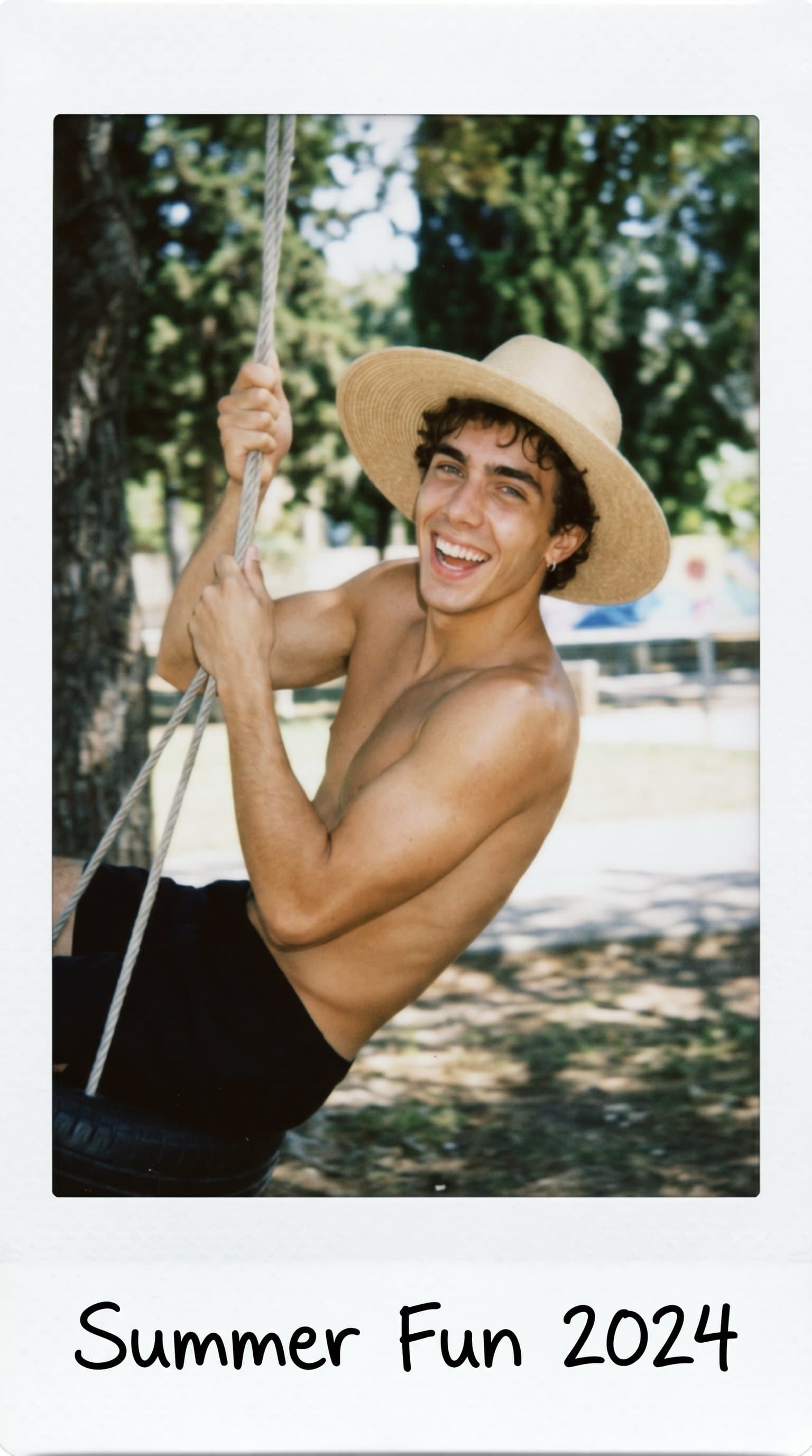 man swinging on a tire swing, Candid Instax Mini P