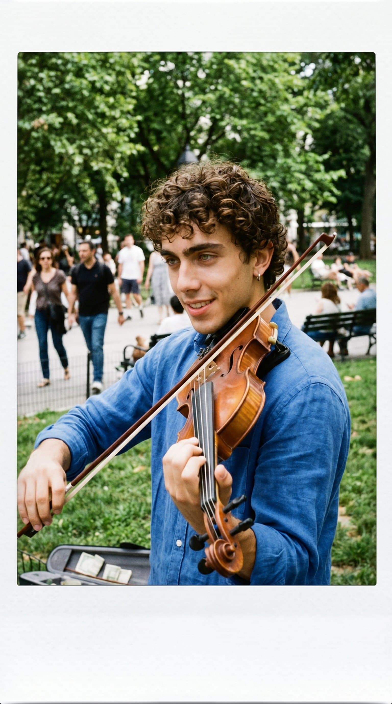 man playing a violin in a park, Candid Instax Mini