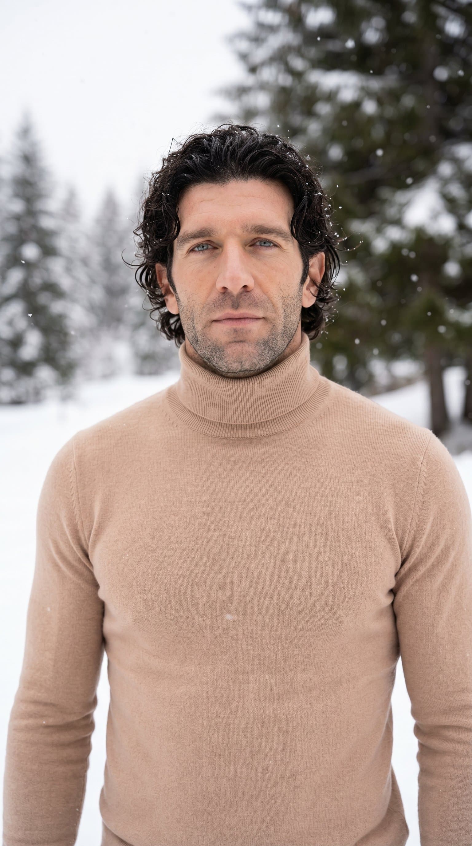 man in a tight-fitting, nude turtleneck sweater against a snowy background, exuding an aura of quiet elegance