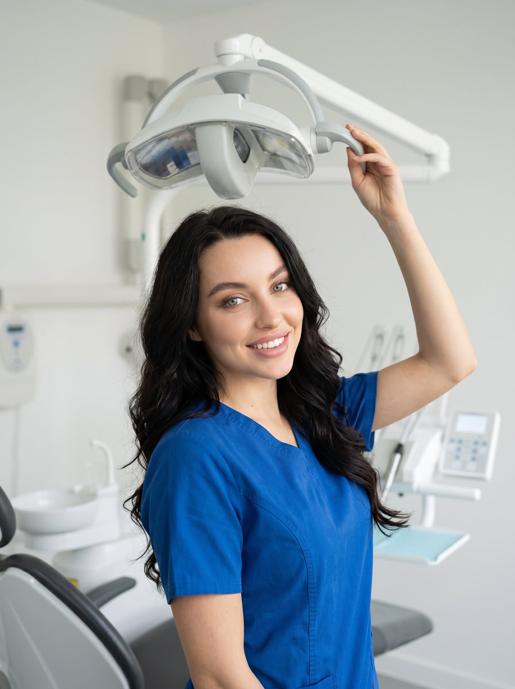 Generate a capturing a dentist adjusting a dental light, with a warm, reassuring expression, set in a minimalistic dental office, emphasizing their readiness and expertise.
