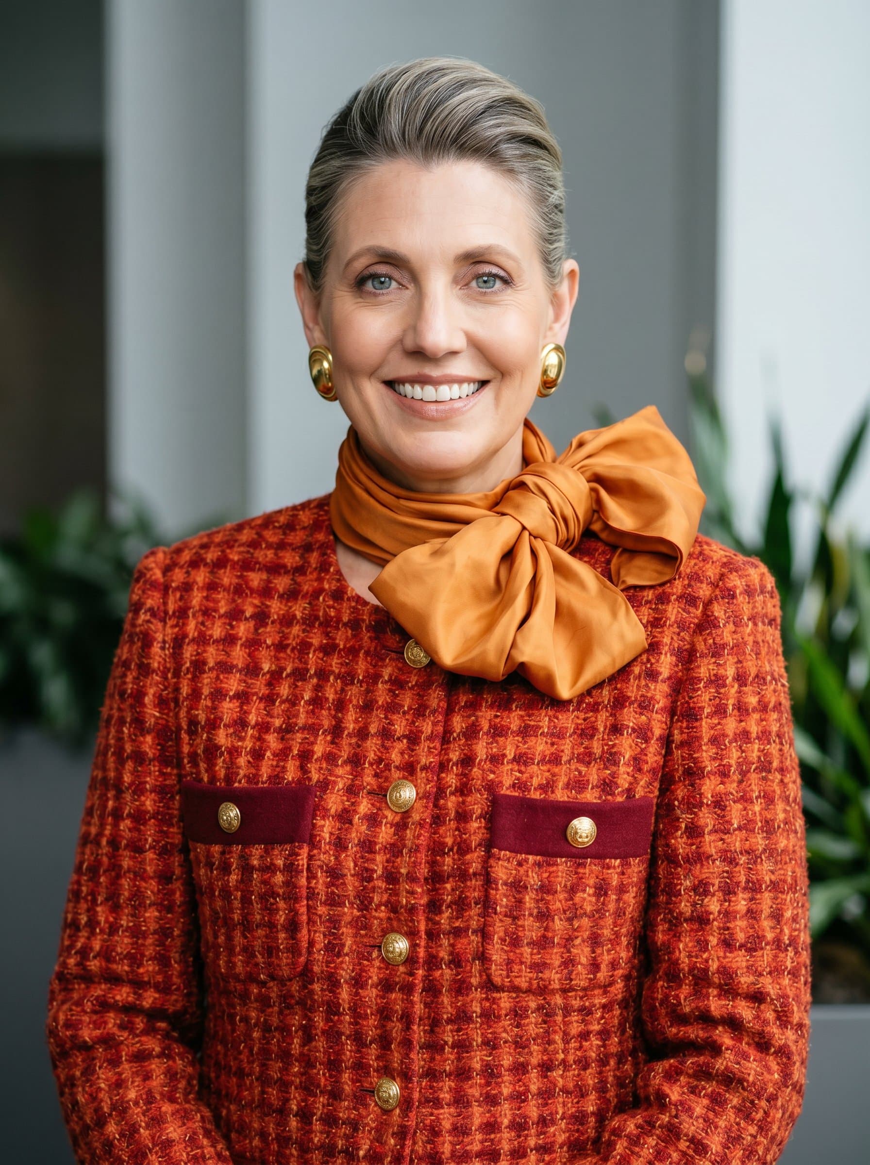 : Create a headshot with a polished and friendly demeanor, set against a simple backdrop to highlight sincerity and focus in political profiles and announcements.