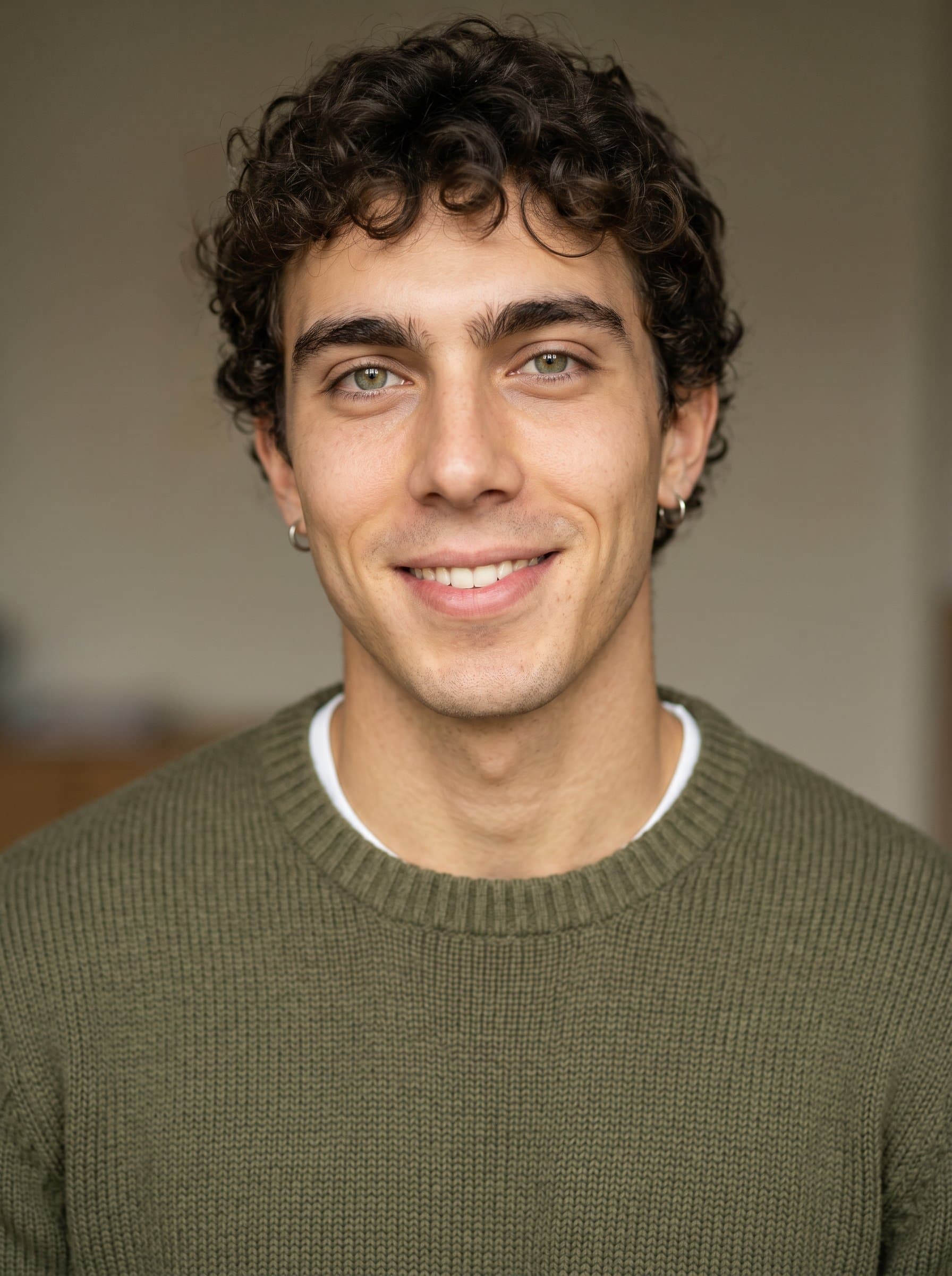 : AI-generated headshot of a pastor with a friendly demeanor, wearing a simple but chic olive green sweater, with a muted light brown background, reflecting their role as a community leader.