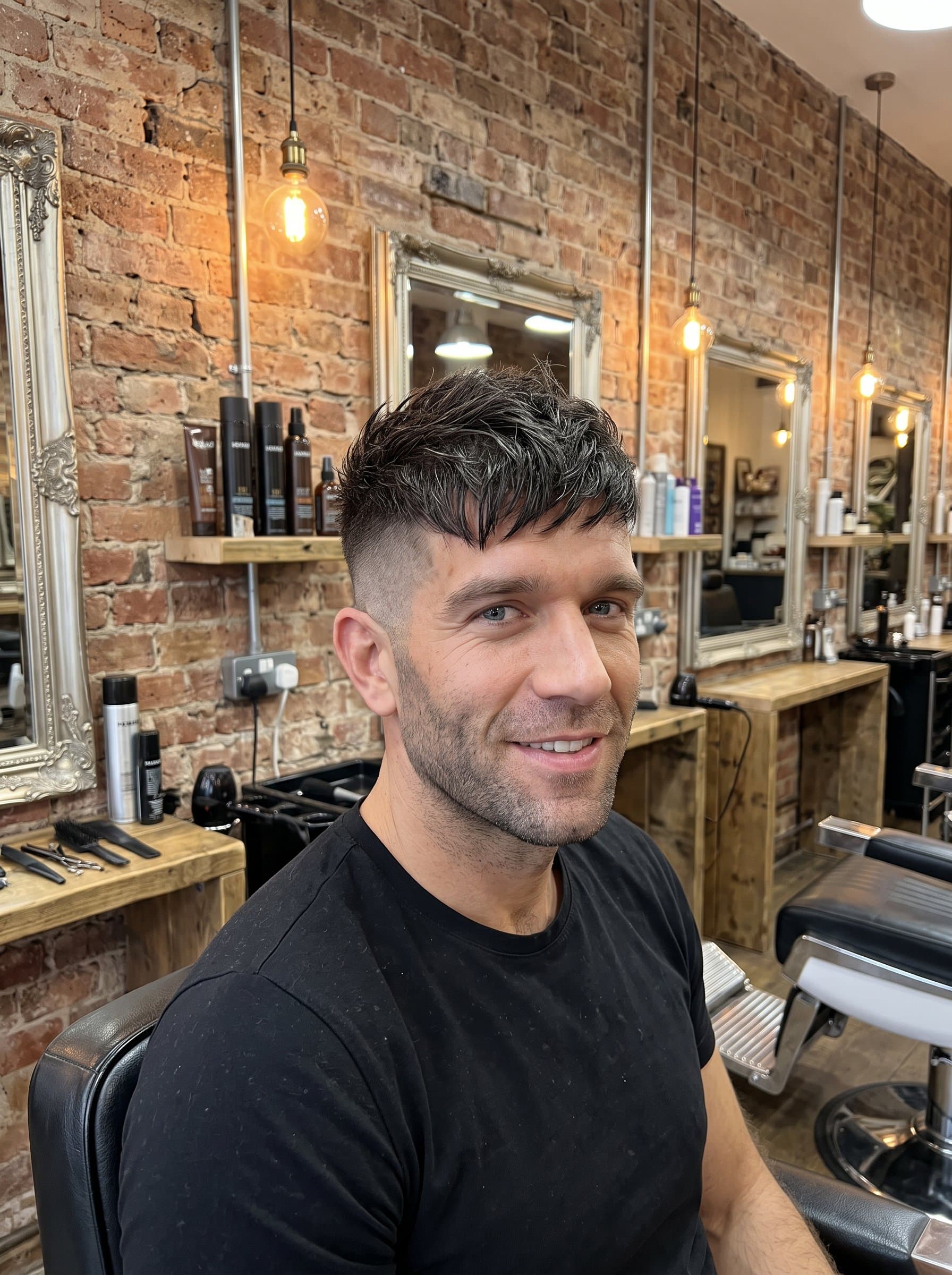 Photograph a in an industrial chic salon, surrounded by exposed brick and vintage mirrors. Their edgy pixie cut with undercuts reflects a trendy, fearless style, appealing to a fashion-forward audience.