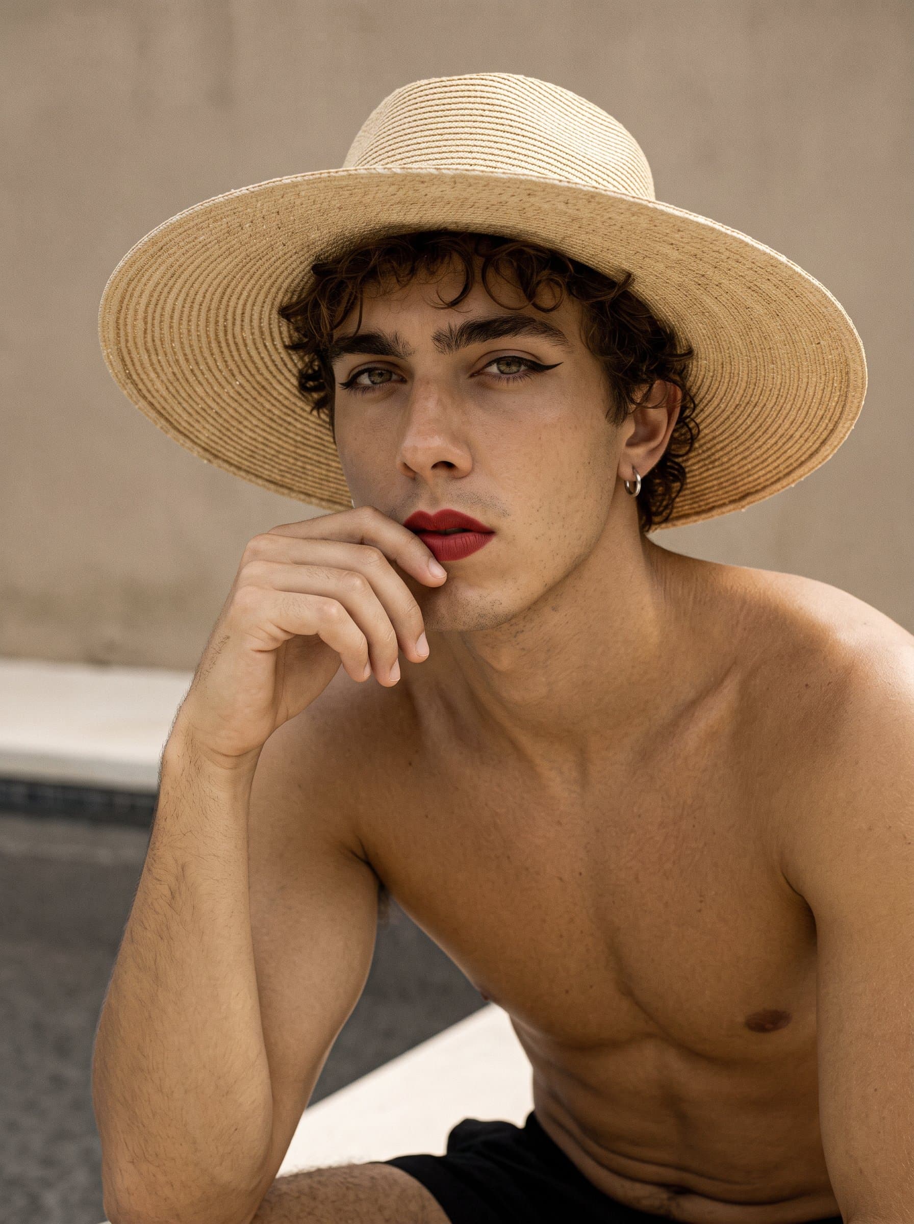 Capture a with a vintage-inspired makeup style, featuring winged eyeliner and bold red lips. The muted sepia background complements the retro aesthetic, highlighting their attention to detail.