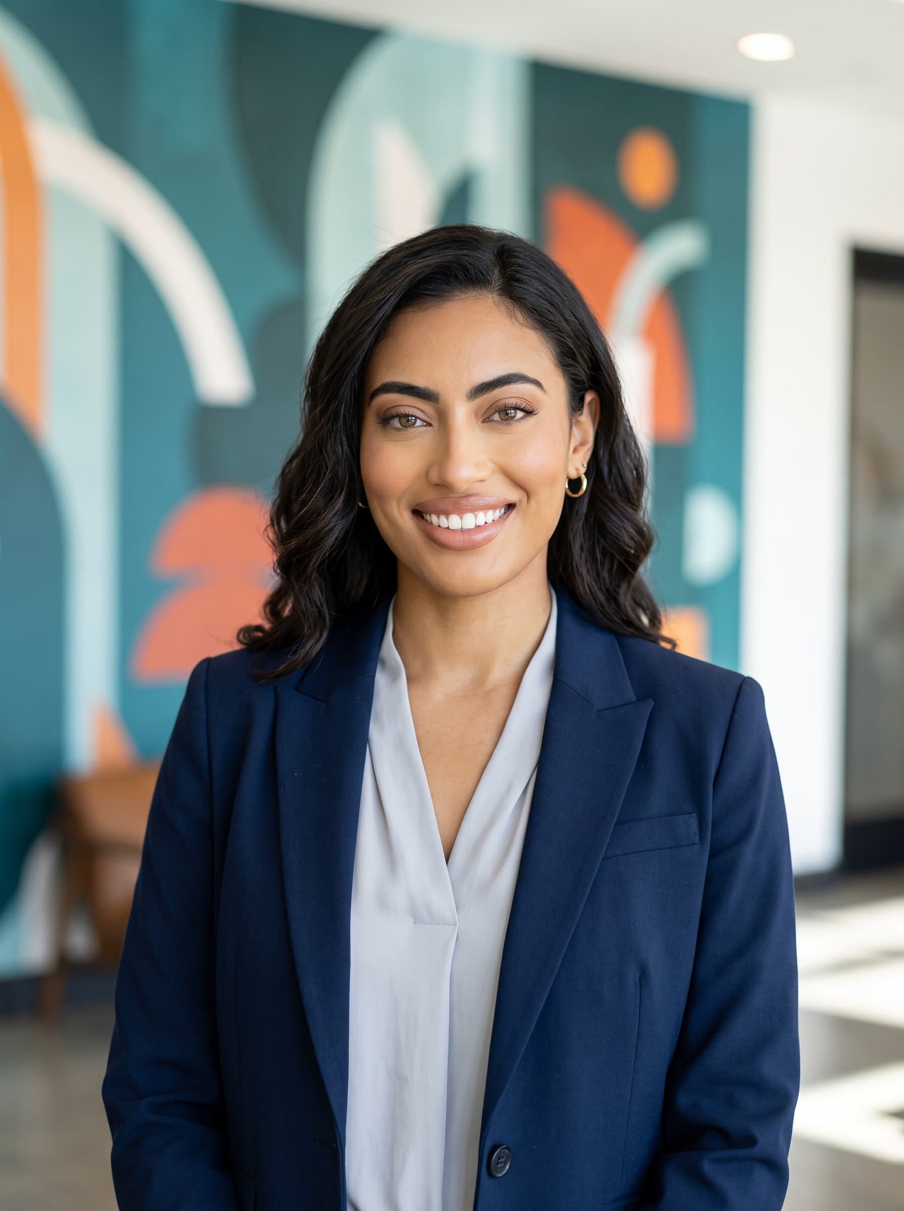 Design a of a marketing expert with a creative backdrop, such as abstract art. Ensure the headshot exudes creativity and professionalism, spotlighting their confident yet approachable demeanor for digital networking profiles.
