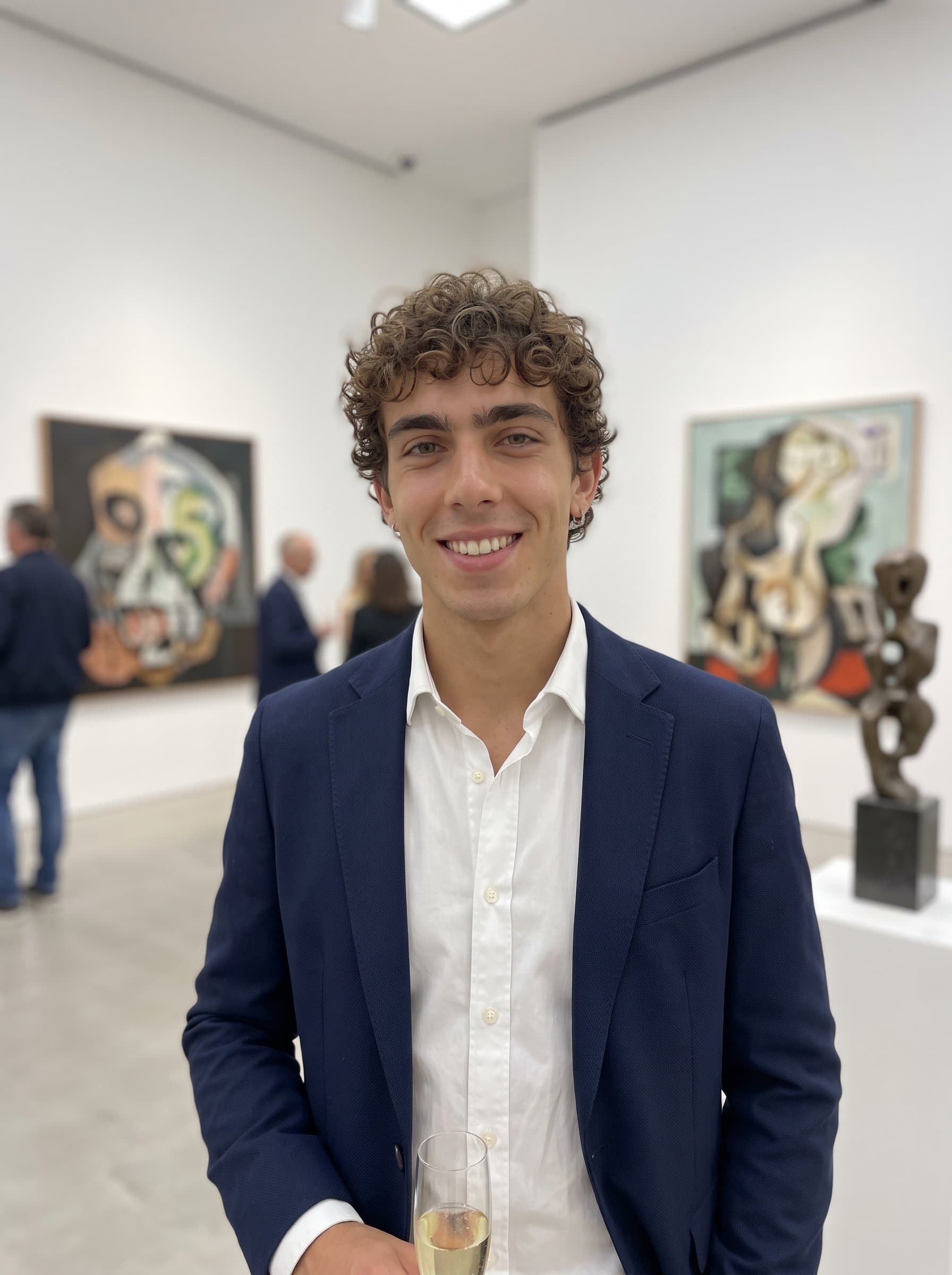 Create a in a chic art gallery, with intriguing artworks in the background, smiling confidently to convey sophistication and approachability for a dating profile.