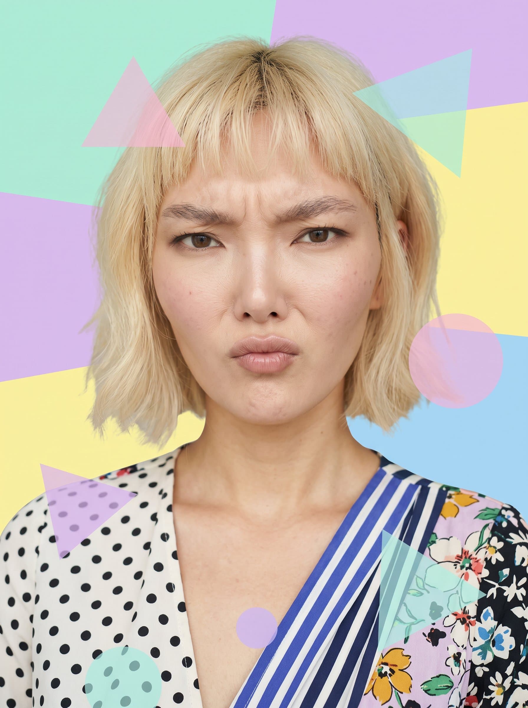 : Eclectic headshot with a perplexed expression. Background: pastel color blocks. Attire: mismatched patterns. Layer translucent geometric shapes for a playful, creative touch.