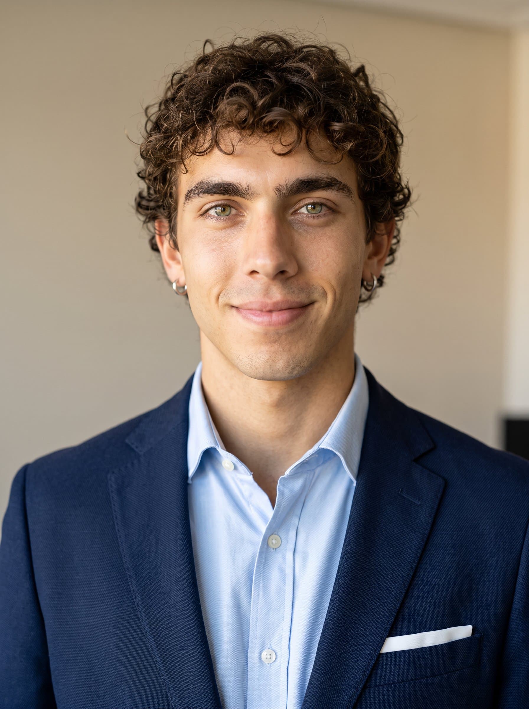 Design a photorealistic headshot of dressed in a smart-casual outfit with a blazer, featuring a gentle, confident smile, set against a neutral background softly bathed in ambient light.