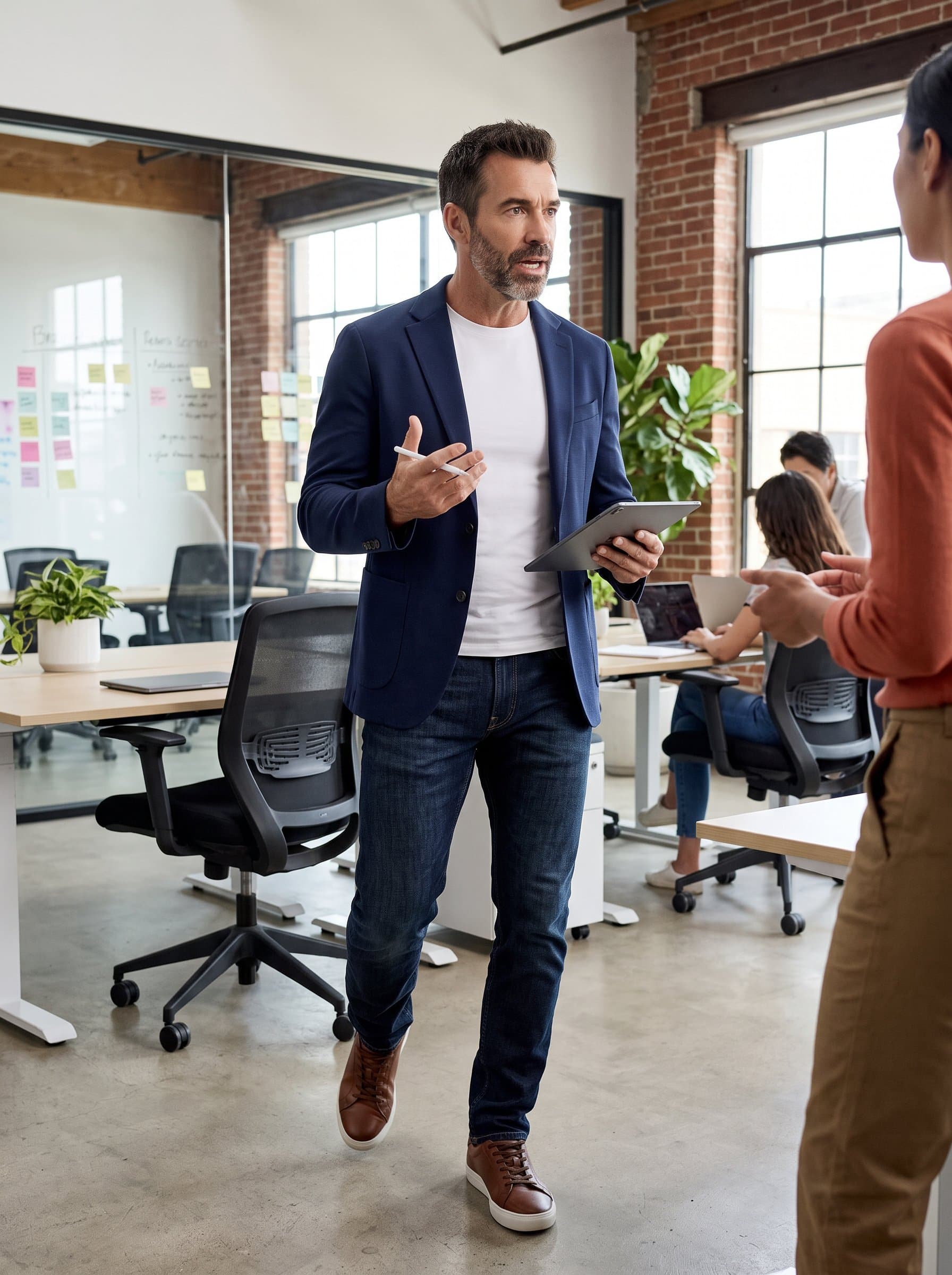Showcase a in a dynamic pose, wearing smart casual attire. The background should suggest a co-working space, promoting innovation and flexibility, suitable for startups and creative industries.